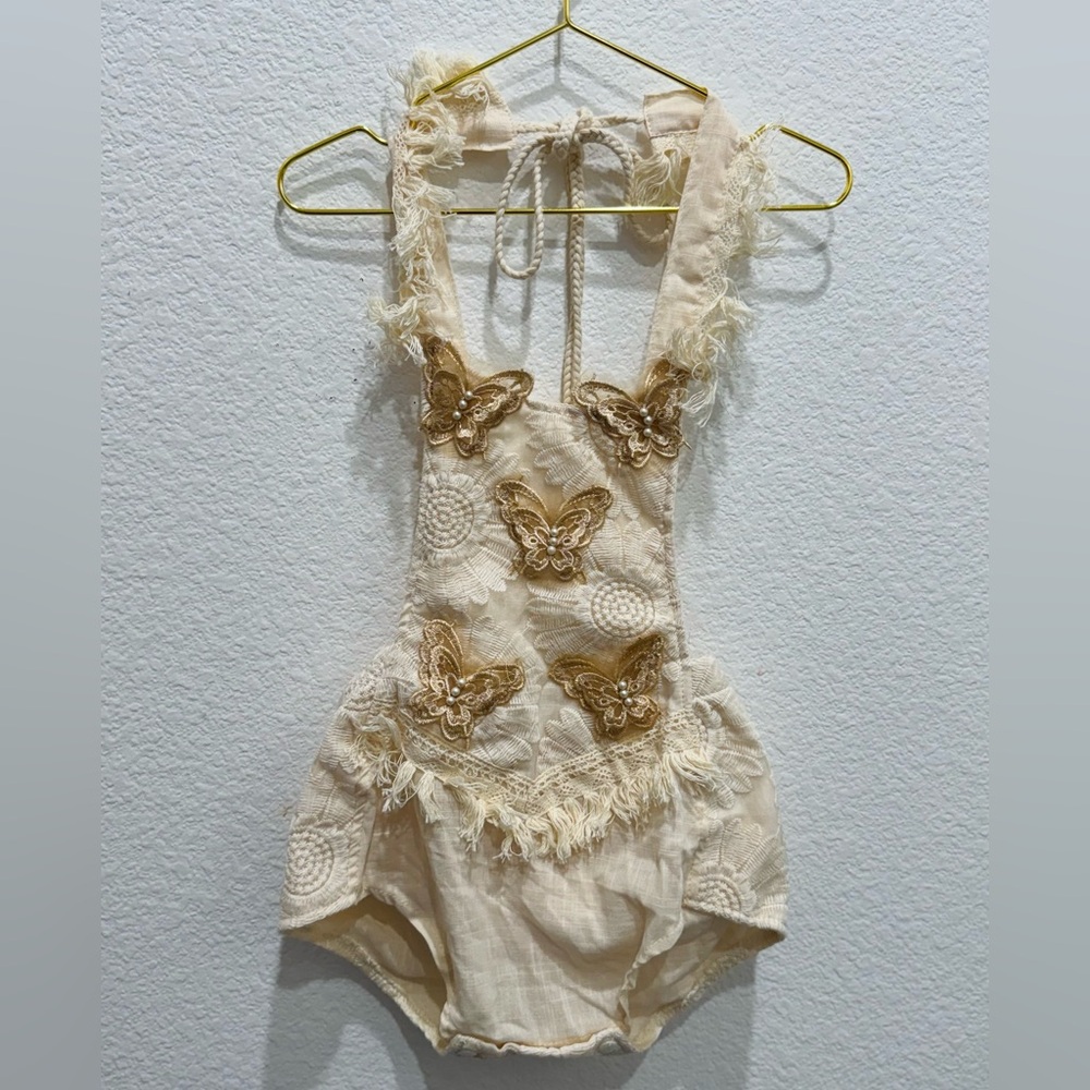 Adorable Boho Butterfly Romper with Lace Butterfly & Pearl details. 12-18 mos.